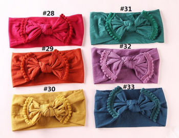 WIDE NYLON BABY HEADBAND WITH POM FRINGE BOW NS9552