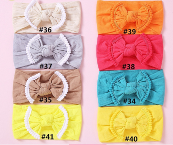 WIDE NYLON BABY HEADBAND WITH POM FRINGE BOW NS9552
