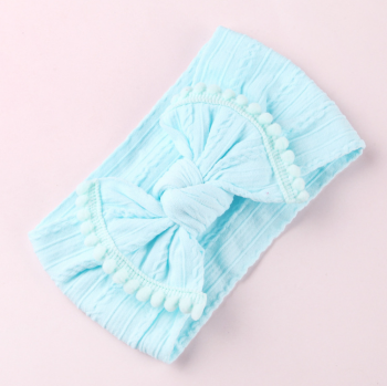 Nylon headband with Pom fringe bow NS9591